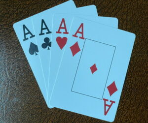 four ace playing cards different suits