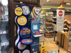 national lottery ticket sales point in a shop