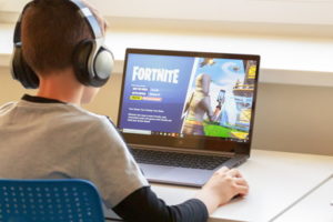 youngster playing fortnite
